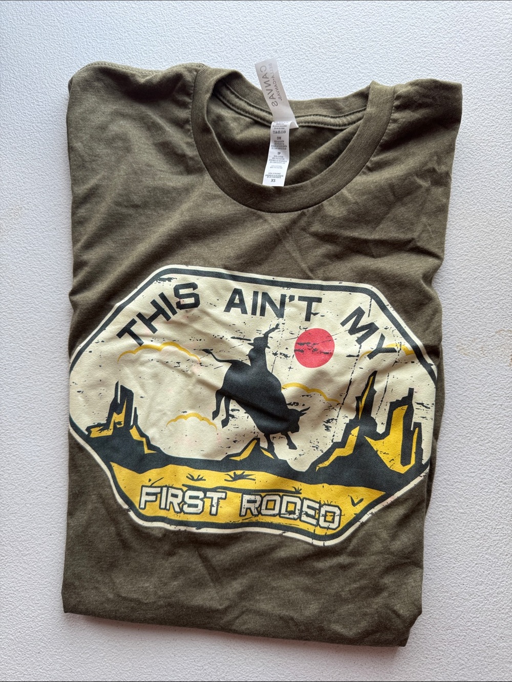 Bella Canvas Olive Green Graphic Tee with Cream, Yellow & Red Print